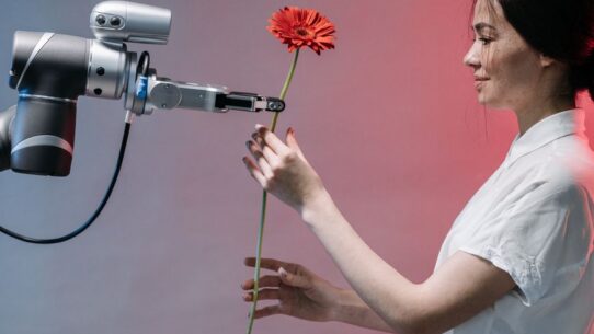 a robot holding a flower